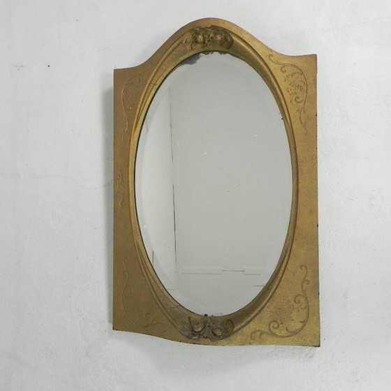 Image 1 of Gold oval mirror with cut edge, 1950s
