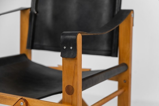 Image 1 of Safaristoel van eikenhout en leer (Denemarken, jaren 80)