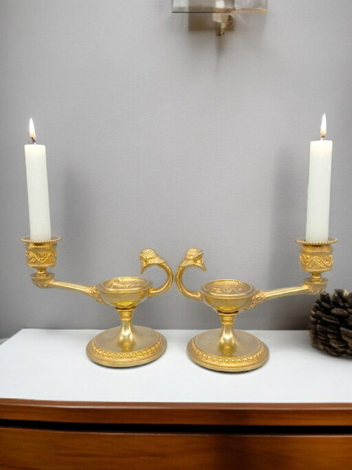 Rare pair of bronze candlesticks depicting Greek mythology