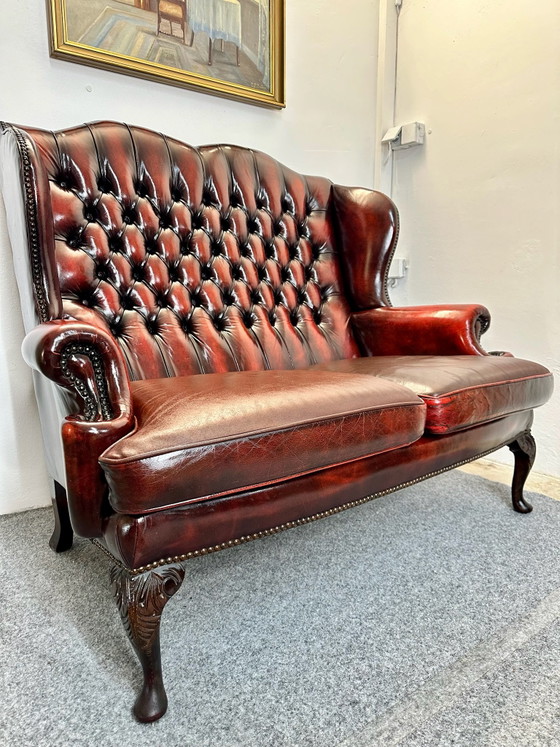 Canapé Chesterfield 2 places style Queen Anne Oxblood Red Angleterre, Canapés 2 places, Cuir, Rouge (photo 10 sur 11)