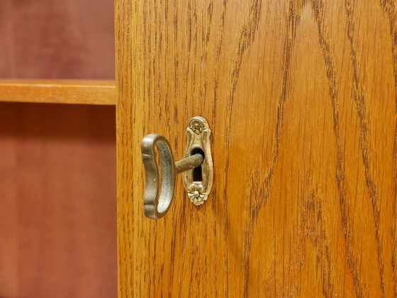 Image 1 of Libreria vintage anni '50, vetrina di metà secolo, impiallacciatura di rovere, ante scorrevoli in vetro, Cabinet Germany