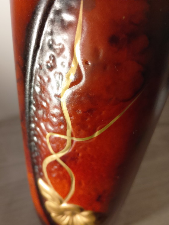 Image 1 of Large porcelain vase, fat lava, West Germany, oxblood red or gold, wavy neck, crystalline sound