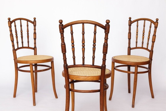 Image 1 of Set van 4 Josef Kohn gebogen houten stoelen – Oostenrijkse vintage jaren 30-50, beukenhout met Weense rieten zittingen, Thonet-s