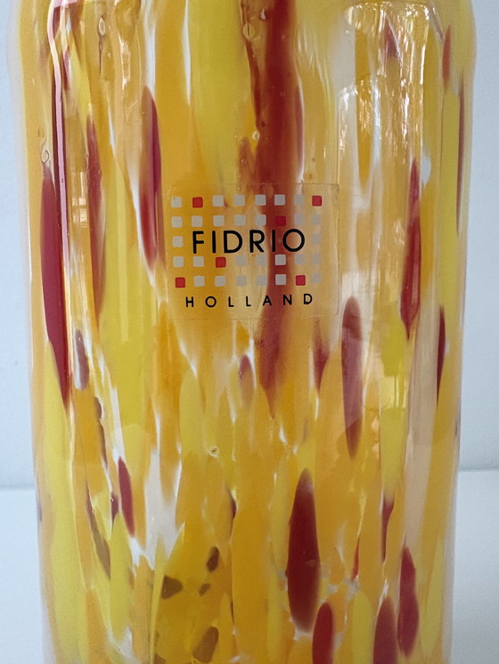 Image 1 of Fidrio Exclusive Collection bottle vase, in yellow, red, and white glass