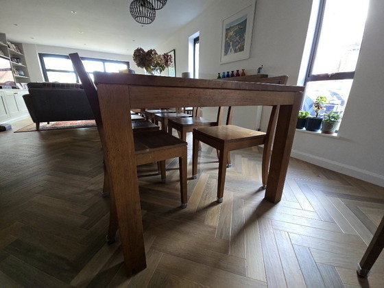 Image 1 of Table à manger Ethnicraft 2,5 m avec 10 chaises