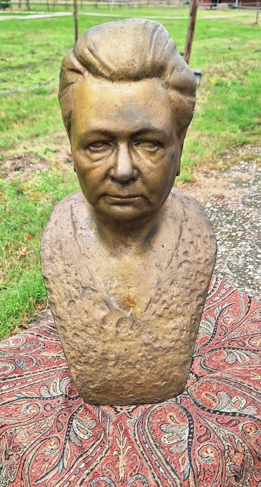 Bust of a woman, bronze colored