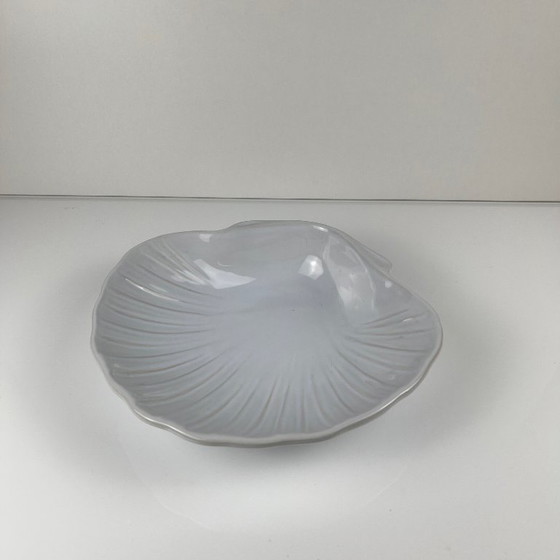 Image 1 of Large platter in the shape of a scallop shell, Emile Henry, France, mid-20th century