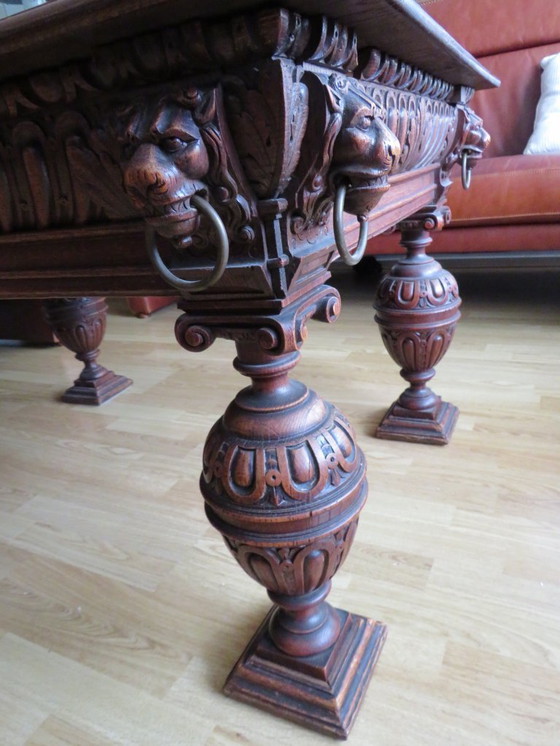 Image 1 of Coffee table with lion head knockers
