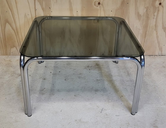 Image 1 of Tavolino da caffè in vetro fumé con struttura tubolare cromata