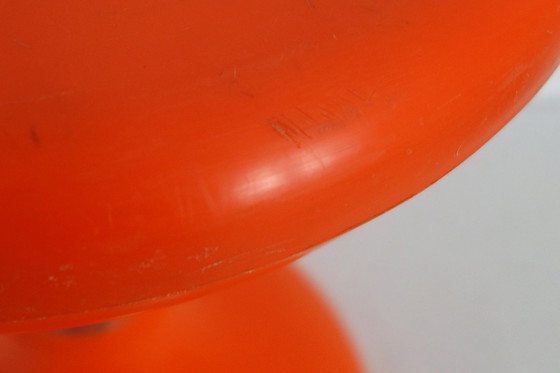 Image 1 of 2 orange diabolo stools from the 70s