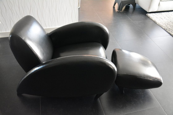Image 1 of Designer armchair with footstool