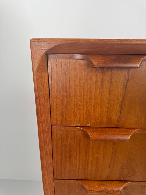 Image 1 of Scandinavian Mid-Century Teak Chest of Drawers – Elegant Sculpted Details