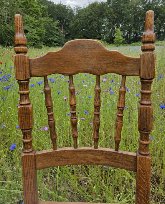 Image 1 of Set van 4 massief eiken stoelen met rieten zitting