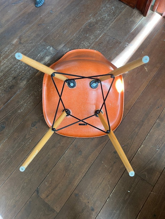 Image 1 of Orange Vitra Eames side chair DSW by Herman Miller (labeled)