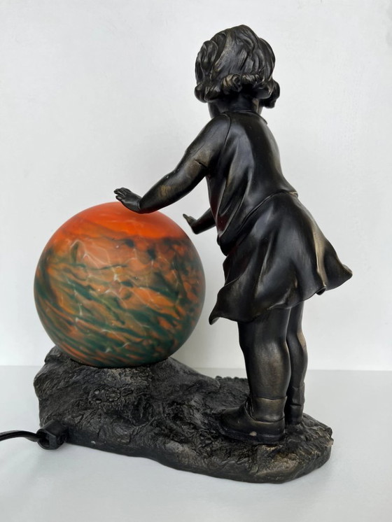 Image 1 of Lampada da tavolo vintage in stile Art Nouveau - Ragazza con palla di vetro arancione