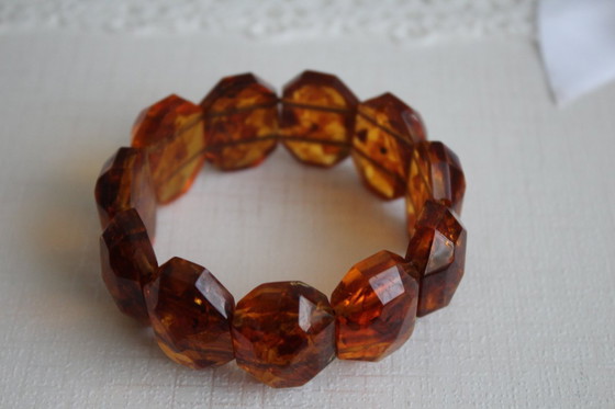 Image 1 of Bracciale in ambra, finemente lavorato, 46 ​​grammi di ambra color miele chiaro, stile Art Déco.