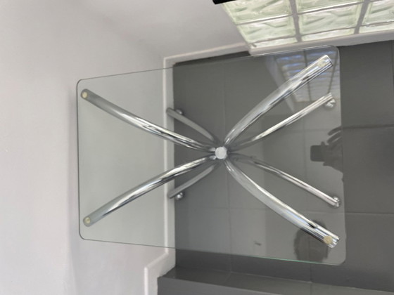 Image 1 of Salontafel van chroom en glas met wielen