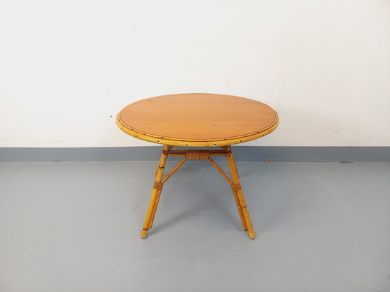 Image 1 of Vintage 1960s round coffee table in rattan and wood