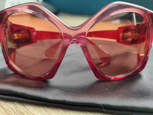 Lunettes de soleil Gucci roses