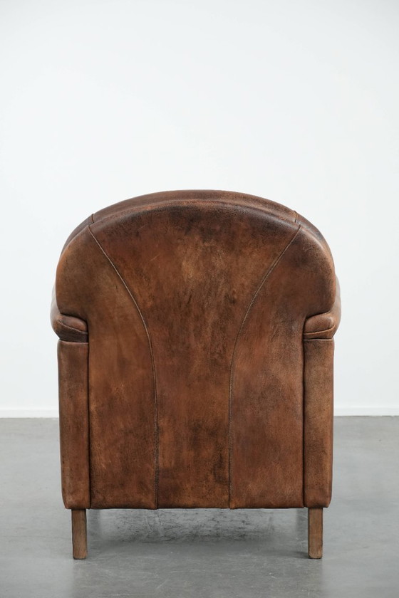 Image 1 of Mooie vintage schapenleren fauteuil/armchair met warme kleuren