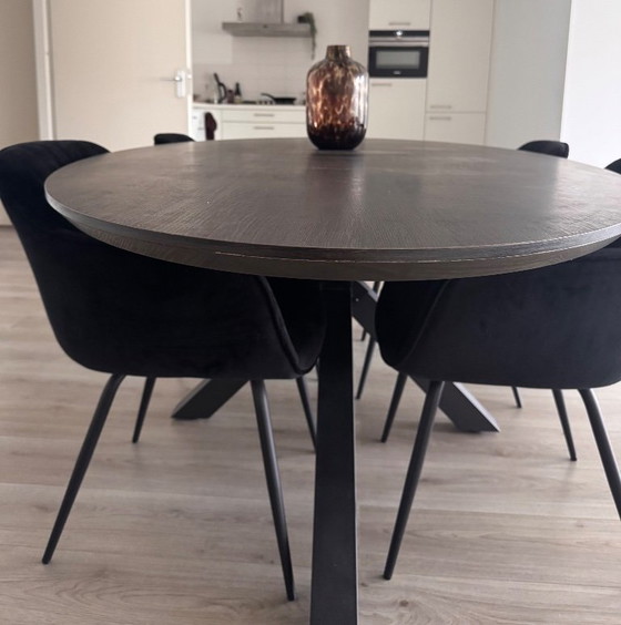 Oval dining table with dark brown top and black base, Haco, Wood, Metal, Modern (photo 3 of 7)