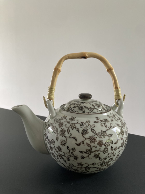 Image 1 of Gray ceramic tea set with brown floral pattern, four cups and a teapot