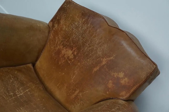 Image 1 of Ein Paar französischer cognacfarbener Ledersessel mit schnurrbartförmigen Rückenlehnen, 1940er Jahre