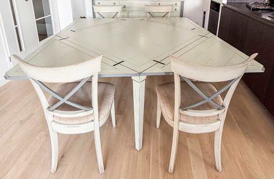Image 1 of Handkerchief table with 4 leaves and 4 chairs