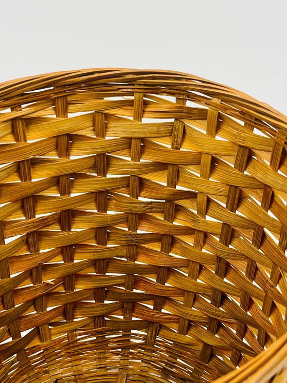 Image 1 of Cache pot vintage en osier tressé