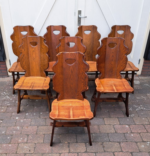 8 x Brutalist oak chairs.