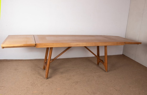 Image 1 of Gran mesa de comedor extensible de roble, diseñada por Guillermo y Chambron para Votre Maison en 1960.