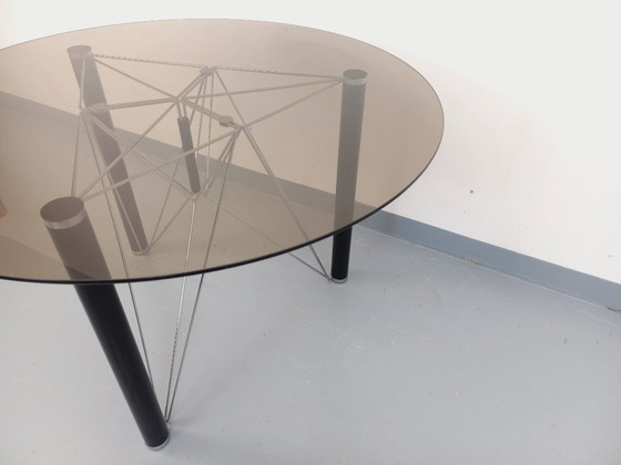 Image 1 of Vintage round dining table in smoked glass, black metal and chrome metal from the 80s