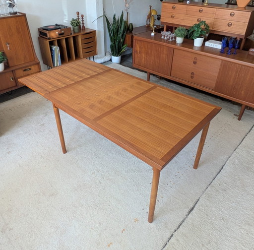 Vintage Scandinavian teak extendable dining table