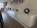 High-gloss white floating sideboard