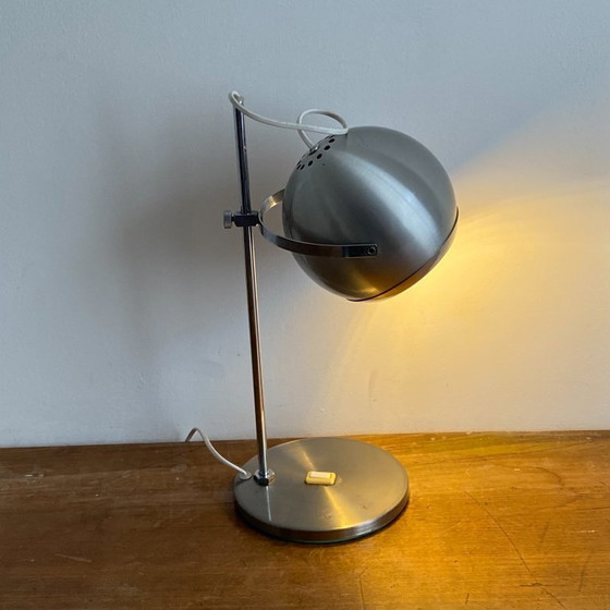 Image 1 of Eyeball lamp. 1970. Brushed stainless steel.