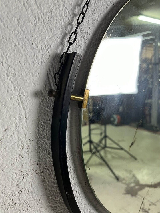 Image 1 of Round varnished metal and brass mirror with chain, 1950s