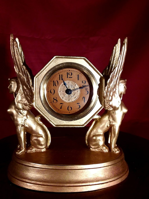 Table Clock “With Sphinxes” – beeldhouwkunst, Metal, Brass