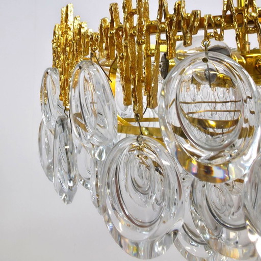 Palwa chandelier in a 1960s Brutalist style with a warm touch. Brass with crystal glass.