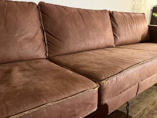 Leather sofa with pouffe