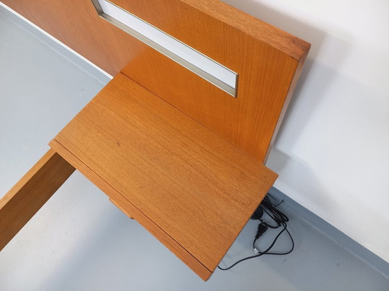 Image 1 of Lit double vintage style scandinave en teck des années 60 avec chevets suspendues et lampes intégrées