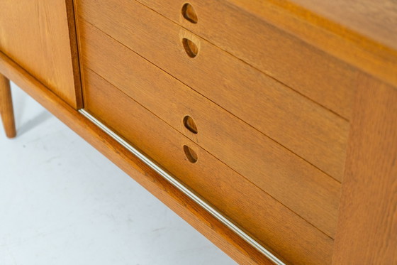 Image 1 of Sideboard by Henry W. Klein for Bramin in oak (Denmark, 1960s).