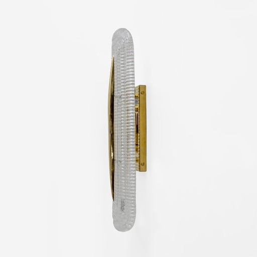 Par de apliques modernos de cristal de Murano transparente y latón, Italia