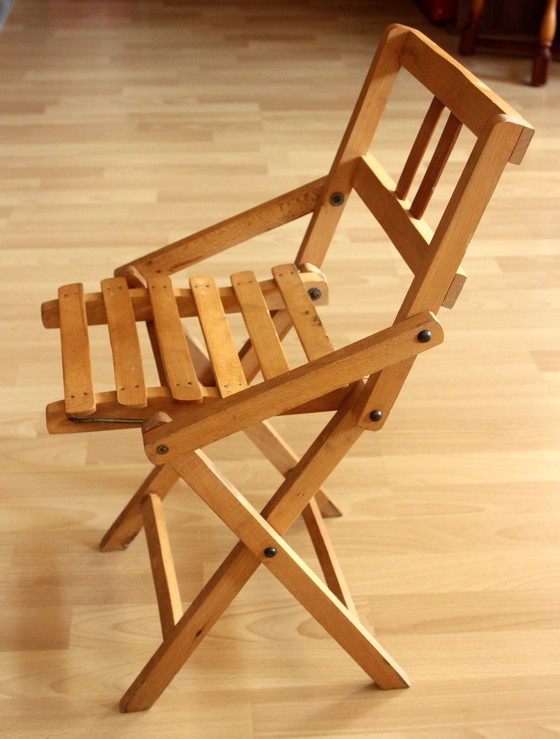 Image 1 of Vintage folding wooden children's chair 50s