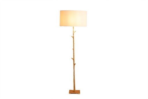 Pair of gilded metal floor lamps. 20th century.