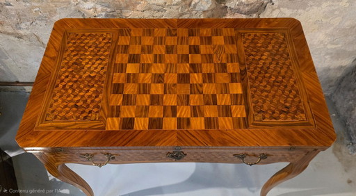 Louis XV style marquetry games table on a rosewood background, circa 1900