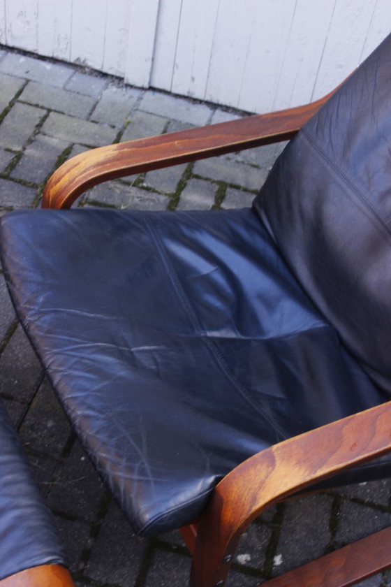 Image 1 of Ikea Vintage - Ikea POÄNG recliner and footstool in black leather, Scandinavian design, 1990s
