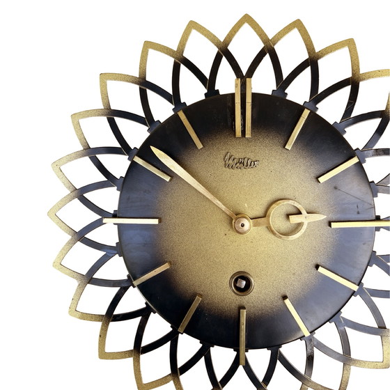 Image 1 of Mechanical sun hanging clock, Müller, Germany, 1960s.