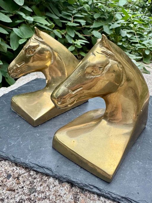 Par de sujetalibros Art Déco de latón con caballos