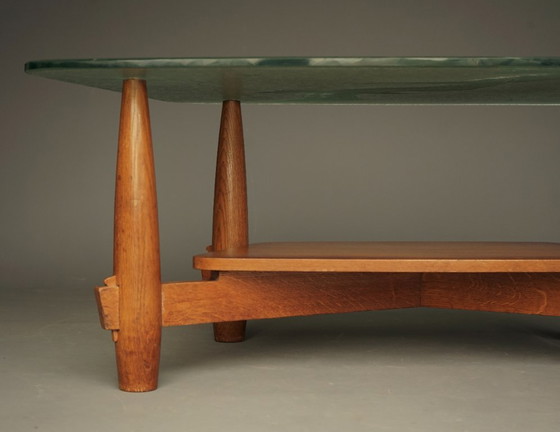 Image 1 of Grote art-deco salontafel met opvallend glazen blad, jaren 1940