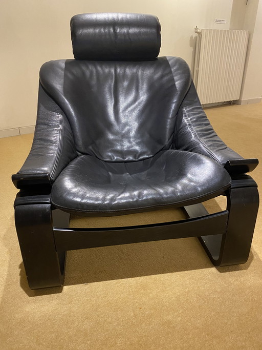 1 Zwarte leren fauteuil